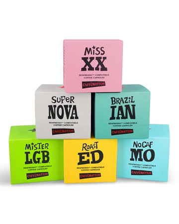 Stacked colourful boxes of Nespresso compatible coffee capsules